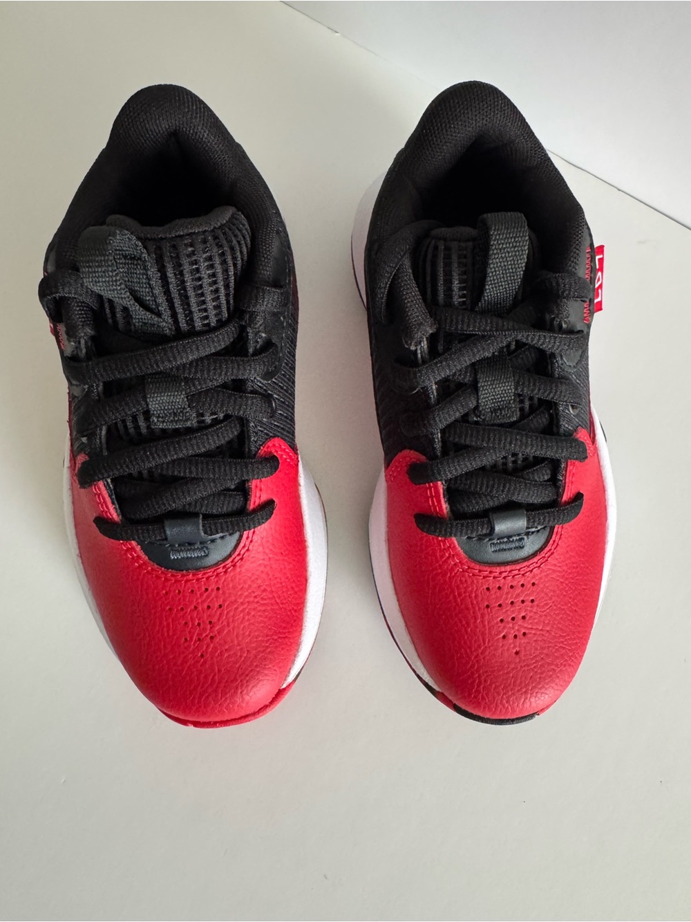 Under Armour Kids Black and Red Athletic Sneakers